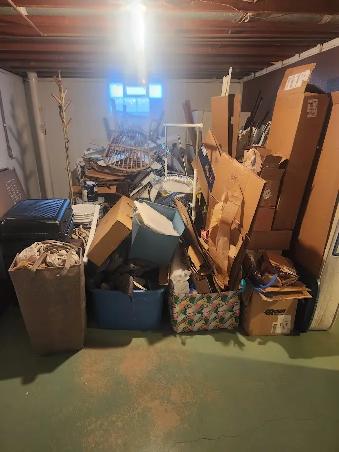 Roll-off dumpster container at job site for 8 Yard Dumpster Rental in Farmingdale